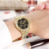 ساعة مايكل كورس للنساء MK7404